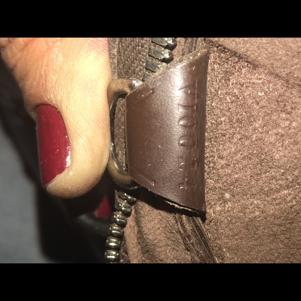 Louis Vuitton dark brown backpack style